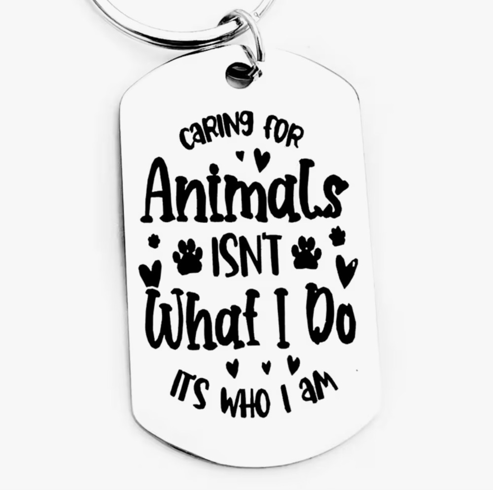 3/$25 Caring For Animals Isn't What I Do It's Who I Am Stainless Steel Keychain
